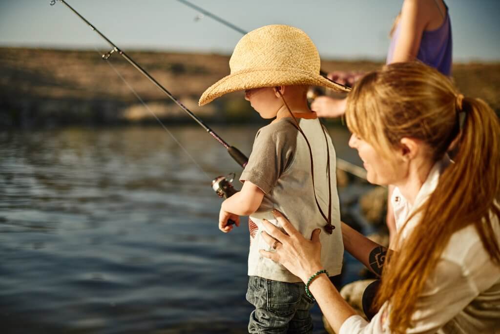 A child and mother fishing.